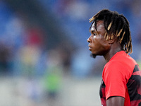 Samuel Chukwueze of AC Milan looks on during the Serie A Enilive match between SS Lazio and AC Milan at Stadio Olimpico on Aug 31, 2024 in R...