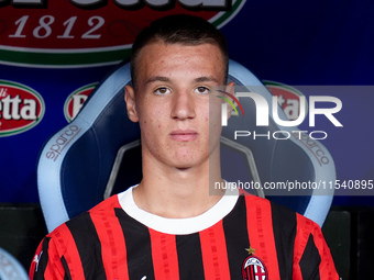 Francesco Camarda of AC Milan looks on during the Serie A Enilive match between SS Lazio and AC Milan at Stadio Olimpico on Aug 31, 2024 in...