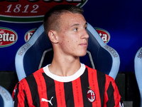 Francesco Camarda of AC Milan looks on during the Serie A Enilive match between SS Lazio and AC Milan at Stadio Olimpico on Aug 31, 2024 in...