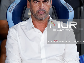 Paulo Fonseca head coach of AC Milan looks on during the Serie A Enilive match between SS Lazio and AC Milan at Stadio Olimpico on Aug 31, 2...