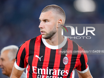 Strahinja Pavlovic of AC Milan looks on during the Serie A Enilive match between SS Lazio and AC Milan at Stadio Olimpico on Aug 31, 2024 in...