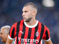 Strahinja Pavlovic of AC Milan looks on during the Serie A Enilive match between SS Lazio and AC Milan at Stadio Olimpico on Aug 31, 2024 in...