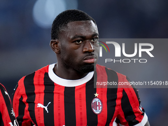 Youssouf Fofana of AC Milan looks on during the Serie A Enilive match between SS Lazio and AC Milan at Stadio Olimpico on Aug 31, 2024 in Ro...