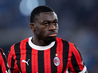 Youssouf Fofana of AC Milan looks on during the Serie A Enilive match between SS Lazio and AC Milan at Stadio Olimpico on Aug 31, 2024 in Ro...