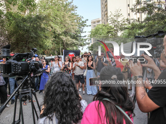 Demonstrators shout slogans as they attend a demonstration staged by human rights activists, women's rights organizations, and civil society...