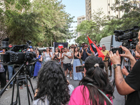 Demonstrators shout slogans as they attend a demonstration staged by human rights activists, women's rights organizations, and civil society...