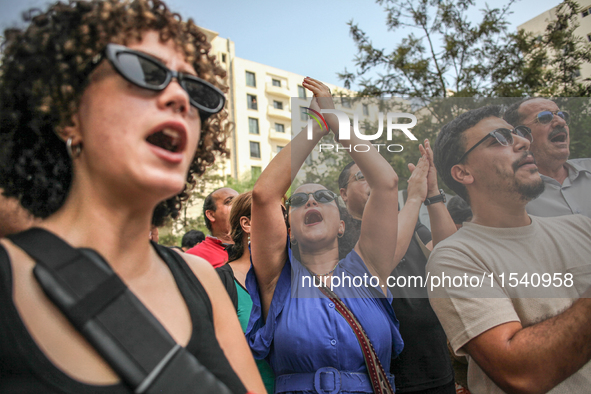 Demonstrators shout slogans as they attend a demonstration staged by human rights activists, women's rights organizations, and civil society...