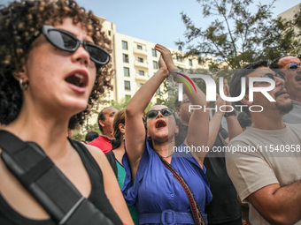 Demonstrators shout slogans as they attend a demonstration staged by human rights activists, women's rights organizations, and civil society...