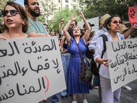 Demonstrators shout slogans as they attend a demonstration staged by human rights activists, women's rights organizations, and civil society...