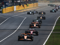 Oscar Piastri of McLaren and Charles Leclerc of Ferrari during the Formula 1 Italian Grand Prix at Autodromo Nazionale di Monza in Monza, It...