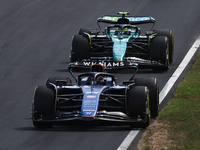 Franco Colapinto of Williams and Fernando Alonso of Aston Martin Aramco during the Formula 1 Italian Grand Prix at Autodromo Nazionale di Mo...