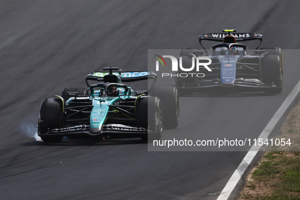 Lance Stroll of Aston Martin Aramco and Franco Colapinto of Williams during the Formula 1 Italian Grand Prix at Autodromo Nazionale di Monza...