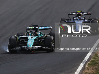 Lance Stroll of Aston Martin Aramco and Franco Colapinto of Williams during the Formula 1 Italian Grand Prix at Autodromo Nazionale di Monza...