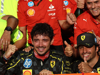 Charles Leclerc, Carlos Sainz of Ferrari and Frederic Vasseur celebrate with the team after the Formula 1 Italian Grand Prix at Autodromo Na...