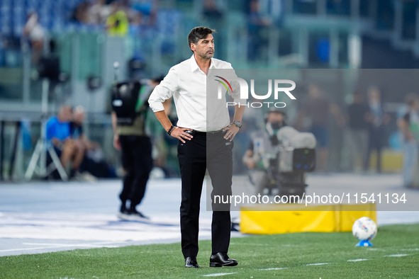 Paulo Fonseca head coach of AC Milan looks on during the Serie A Enilive match between SS Lazio and AC Milan at Stadio Olimpico on Aug 31, 2...