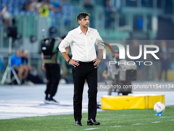 Paulo Fonseca head coach of AC Milan looks on during the Serie A Enilive match between SS Lazio and AC Milan at Stadio Olimpico on Aug 31, 2...