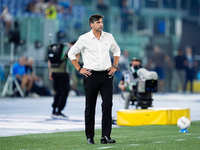 Paulo Fonseca head coach of AC Milan looks on during the Serie A Enilive match between SS Lazio and AC Milan at Stadio Olimpico on Aug 31, 2...