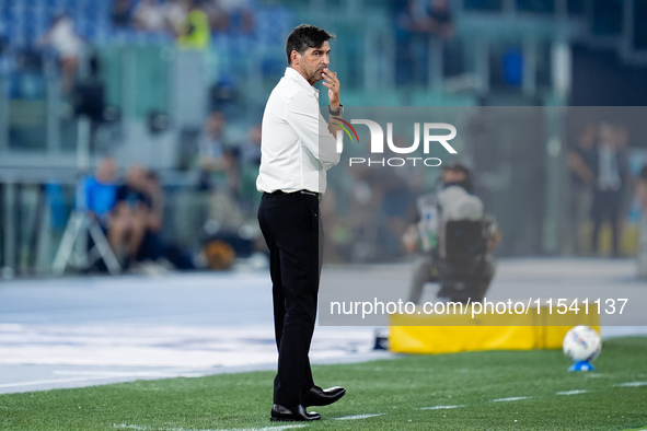 Paulo Fonseca head coach of AC Milan looks on during the Serie A Enilive match between SS Lazio and AC Milan at Stadio Olimpico on Aug 31, 2...