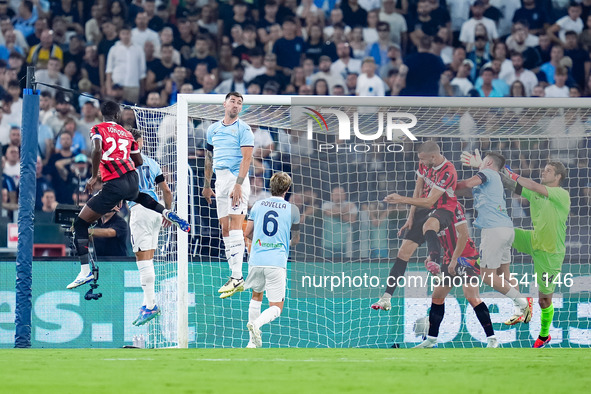 Strahinja Pavlovic of AC Milan scores first goal during the Serie A Enilive match between SS Lazio and AC Milan at Stadio Olimpico on Aug 31...