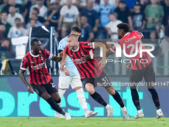 Strahinja Pavlovic of AC Milan celebrates after scoring first goal during the Serie A Enilive match between SS Lazio and AC Milan at Stadio...