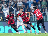 Strahinja Pavlovic of AC Milan celebrates after scoring first goal during the Serie A Enilive match between SS Lazio and AC Milan at Stadio...