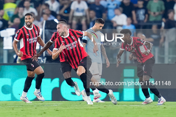 Strahinja Pavlovic of AC Milan celebrates after scoring first goal during the Serie A Enilive match between SS Lazio and AC Milan at Stadio...