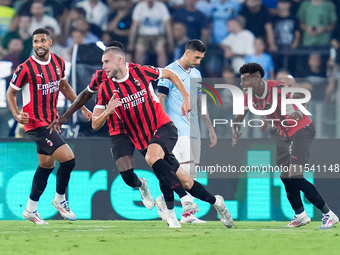 Strahinja Pavlovic of AC Milan celebrates after scoring first goal during the Serie A Enilive match between SS Lazio and AC Milan at Stadio...