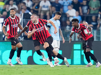 Strahinja Pavlovic of AC Milan celebrates after scoring first goal during the Serie A Enilive match between SS Lazio and AC Milan at Stadio...