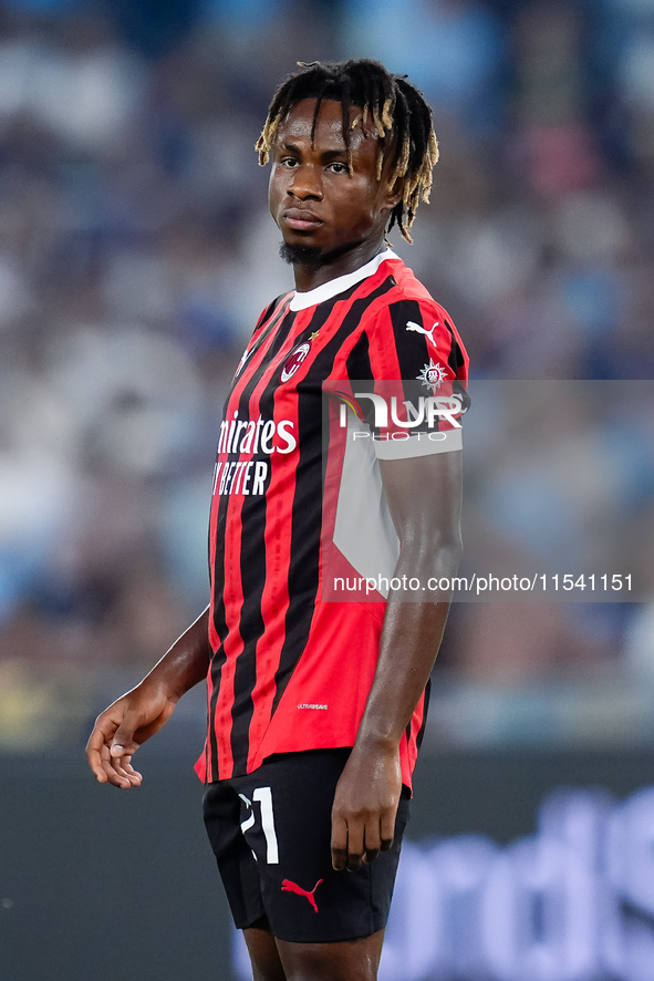 Samuel Chukwueze of AC Milan looks on during the Serie A Enilive match between SS Lazio and AC Milan at Stadio Olimpico on Aug 31, 2024 in R...