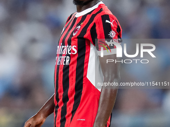 Samuel Chukwueze of AC Milan looks on during the Serie A Enilive match between SS Lazio and AC Milan at Stadio Olimpico on Aug 31, 2024 in R...