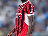 Samuel Chukwueze of AC Milan looks on during the Serie A Enilive match between SS Lazio and AC Milan at Stadio Olimpico on Aug 31, 2024 in R...