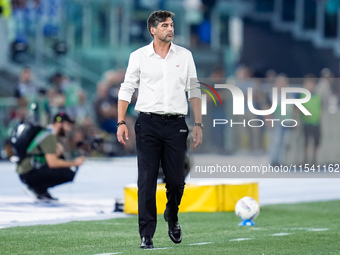 Paulo Fonseca head coach of AC Milan looks on during the Serie A Enilive match between SS Lazio and AC Milan at Stadio Olimpico on Aug 31, 2...