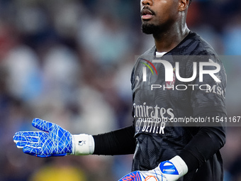 Mike Maignan of AC Milan looks on during the Serie A Enilive match between SS Lazio and AC Milan at Stadio Olimpico on Aug 31, 2024 in Rome,...