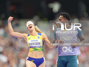 Lorena Silva Spoladore of Brazil celebrates winning gold in Women's 100m - T11 Semi-Finals during the Paris 2024 Paralympic Games at Stade d...