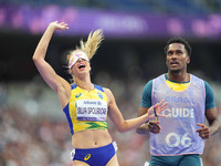 Lorena Silva Spoladore of Brazil celebrates winning gold in Women's 100m - T11 Semi-Finals during the Paris 2024 Paralympic Games at Stade d...