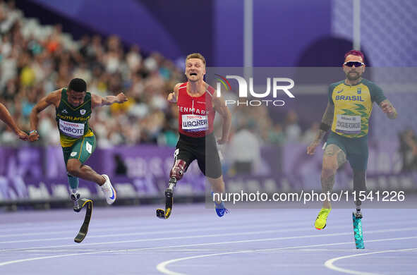 Daniel Wagner of Denmark celebrates winning silver in Men's 100m - T63 Final during the Paris 2024 Paralympic Games at Stade de France on Se...