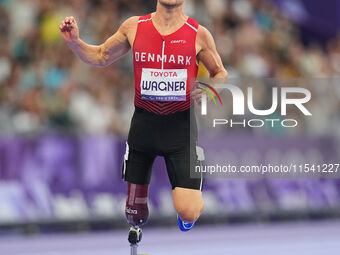 Daniel Wagner of Denmark celebrates winning silver in Men's 100m - T63 Final during the Paris 2024 Paralympic Games at Stade de France on Se...