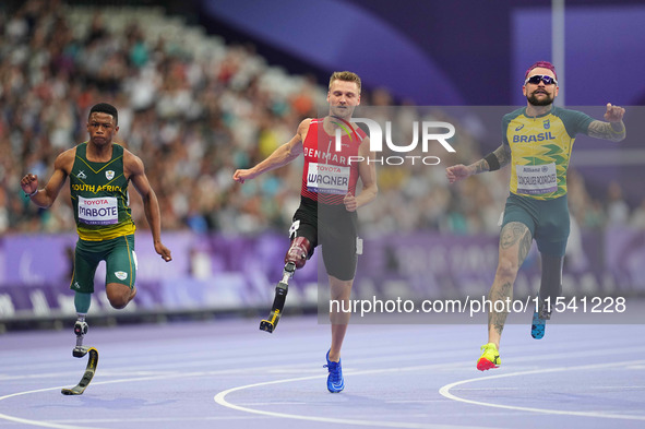 Daniel Wagner of Denmark celebrates winning silver in Men's 100m - T63 Final during the Paris 2024 Paralympic Games at Stade de France on Se...