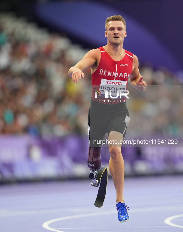 Daniel Wagner of Denmark celebrates winning silver in Men's 100m - T63 Final during the Paris 2024 Paralympic Games at Stade de France on Se...