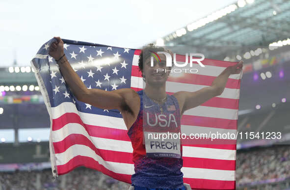 Ezra Frech of United States of America celebrates winning gold in Men's 100m - T63 Final during the Paris 2024 Paralympic Games at Stade de...