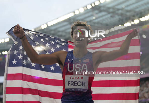 Ezra Frech of United States of America celebrates winning gold in Men's 100m - T63 Final during the Paris 2024 Paralympic Games at Stade de...