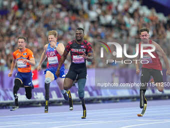 Sherman Isidro Guity Guity of Costa Rica celebrates winning gold in Men's 100m - T64 Final during the Paris 2024 Paralympic Games at Stade d...