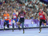 Sherman Isidro Guity Guity of Costa Rica celebrates winning gold in Men's 100m - T64 Final during the Paris 2024 Paralympic Games at Stade d...