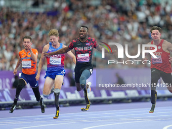 Sherman Isidro Guity Guity of Costa Rica celebrates winning gold in Men's 100m - T64 Final during the Paris 2024 Paralympic Games at Stade d...