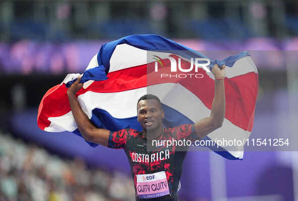 Sherman Isidro Guity Guity of Costa Rica celebrates winning gold in Men's 100m - T64 Final during the Paris 2024 Paralympic Games at Stade d...