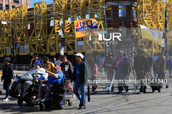 A large number of people participate in the Labour Day Parade in Downtown Toronto, Canada, on September 2, 2024. 