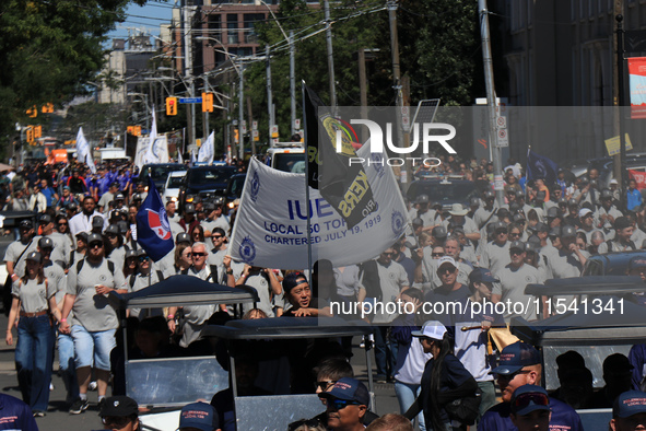 A large number of people participate in the Labour Day Parade in Downtown Toronto, Canada, on September 2, 2024. 