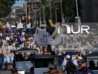 A large number of people participate in the Labour Day Parade in Downtown Toronto, Canada, on September 2, 2024. (