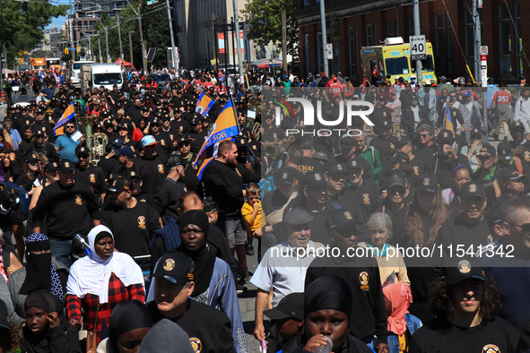 A large number of people participate in the Labour Day Parade in Downtown Toronto, Canada, on September 2, 2024. 