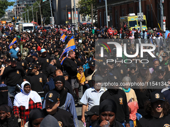 A large number of people participate in the Labour Day Parade in Downtown Toronto, Canada, on September 2, 2024. (